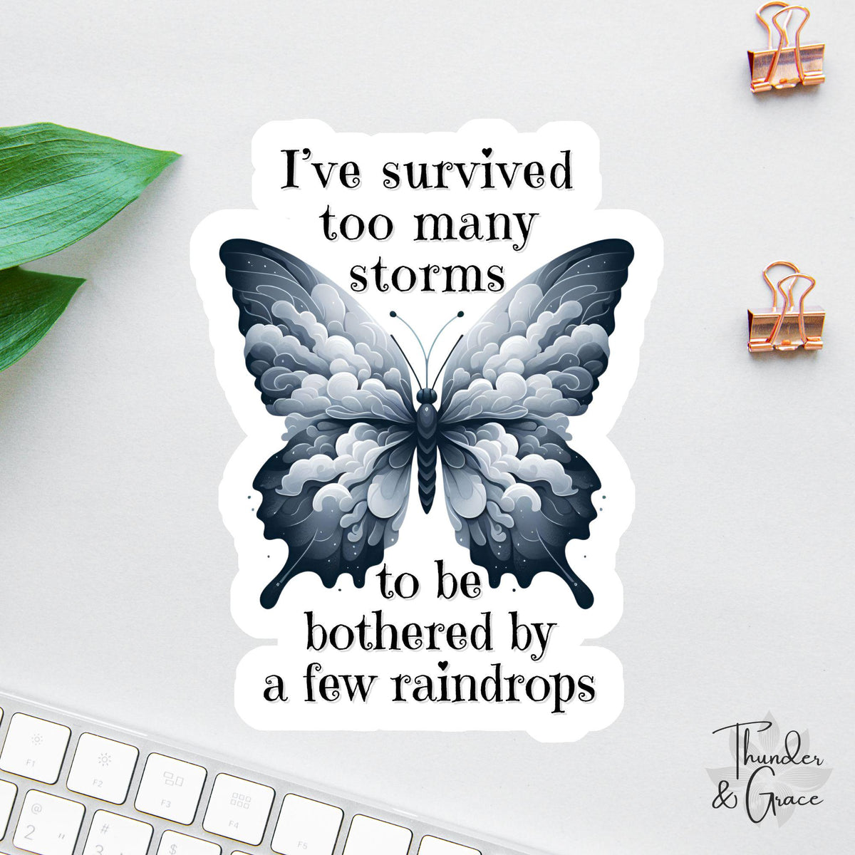 I've Survived Too Many Storms to Be Bothered by a Few Raindrops sticker, dark butterfly