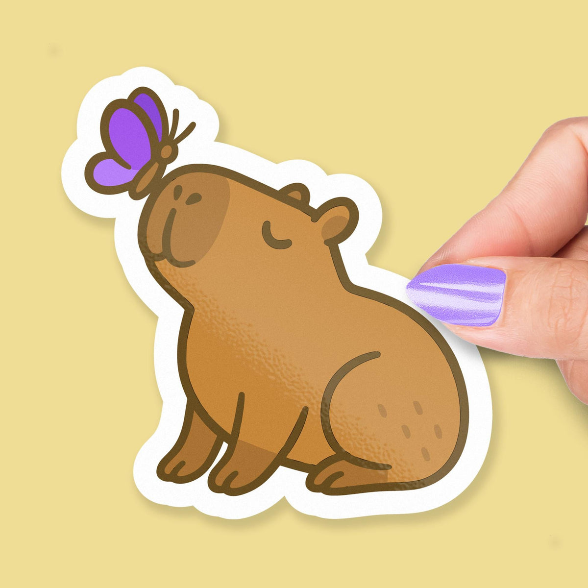 Capybara with Purple Butterfly: Cute Kawaii Animal for Laptops or Journals sticker