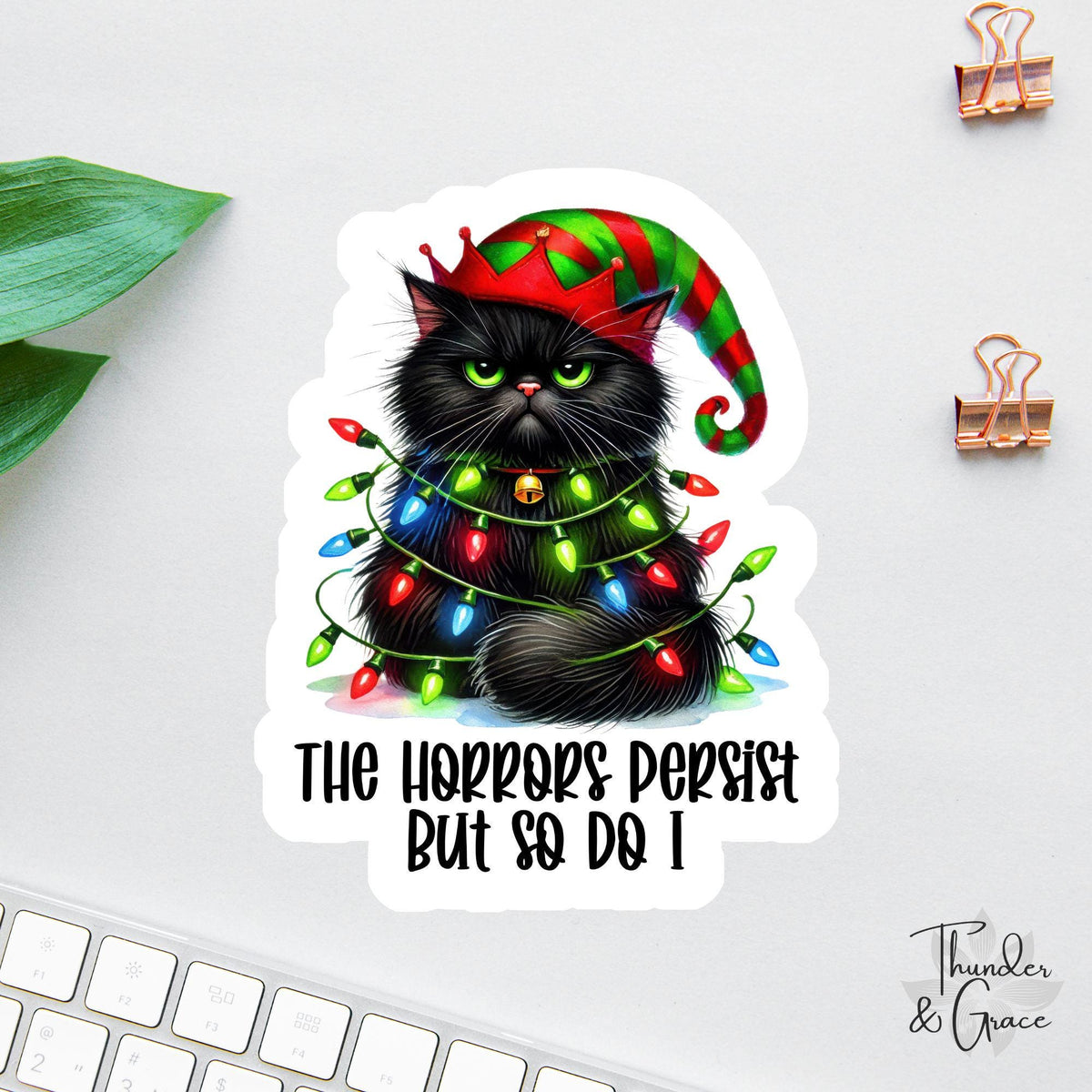 The Horrors Persist But So Do I sticker, festive black cat with christmas lights