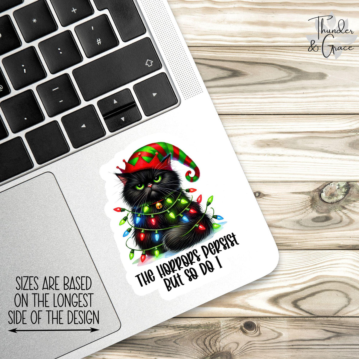 The Horrors Persist But So Do I sticker, festive black cat with christmas lights – view 3