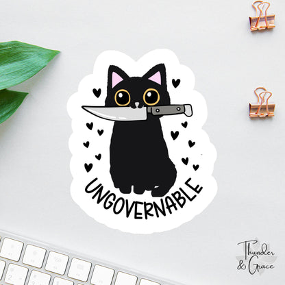 Ungovernable sticker, snarky black cat with knife