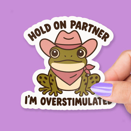 Hold on Partner I’m Overstimulated Frog sticker, funny cowboy frog